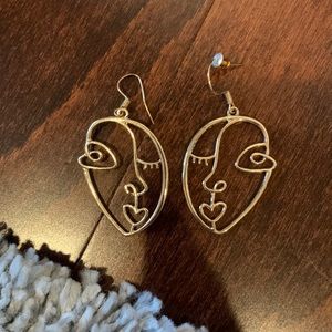 H&M artistic face earrings
